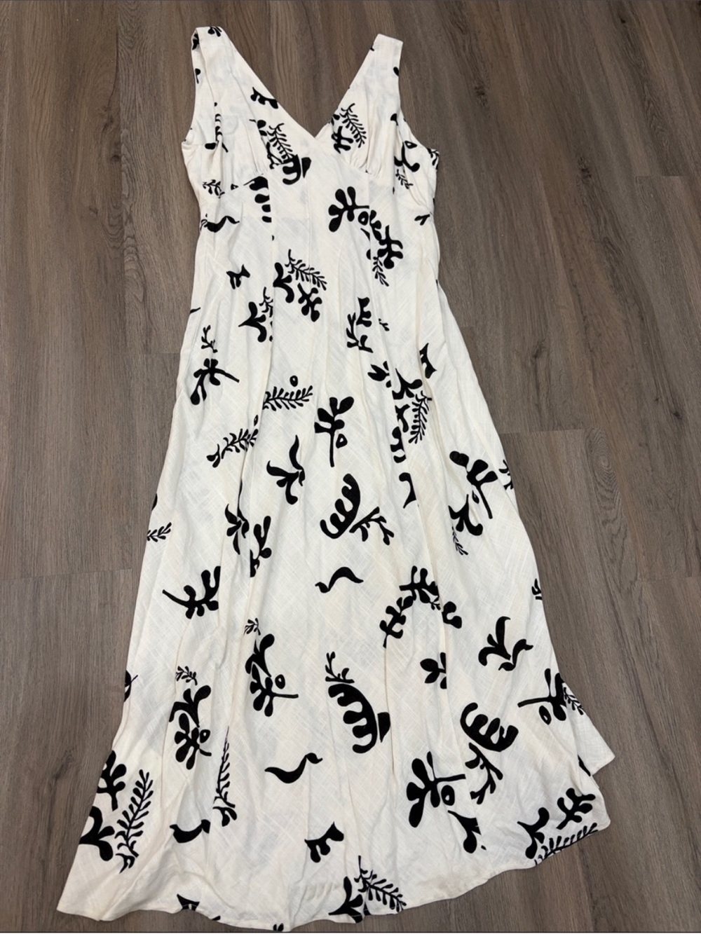 Sleeveless White Maxi Dress with Black Floral Print